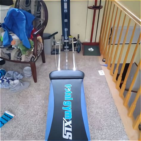 When laying in the streamlined position, the Total Gym rear foot lays on the ground, so you will need to bend your knees so that your feet do not hit the ground. . Used total gym for sale
